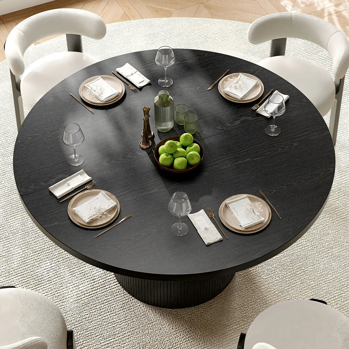 Black fluted round dining table — front angle
