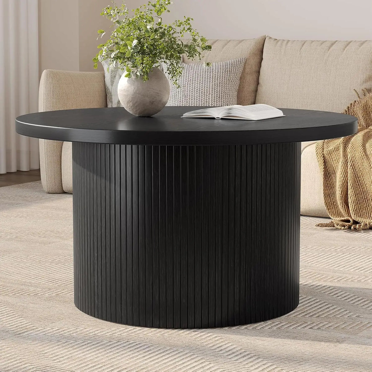 Modern fluted round coffee table in black — front angle