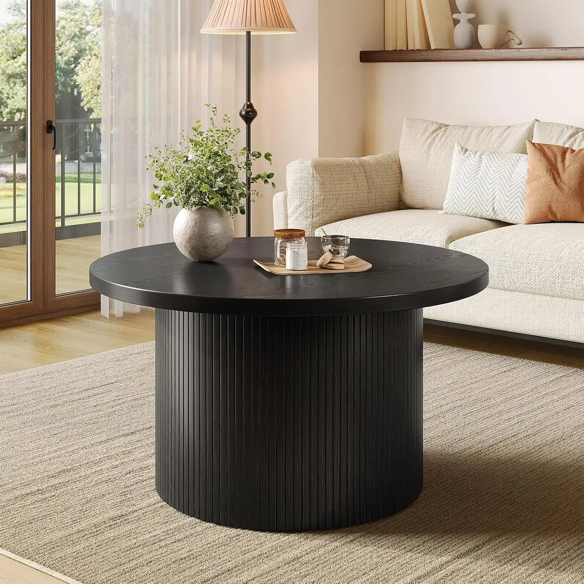 Modern fluted round coffee table in black — close-up design detail