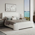 Upholstered wingback platform bed — product detail view