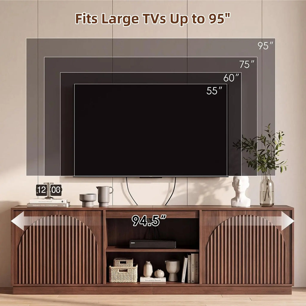 Fluted walnut TV stand with enclosed storage in a living room