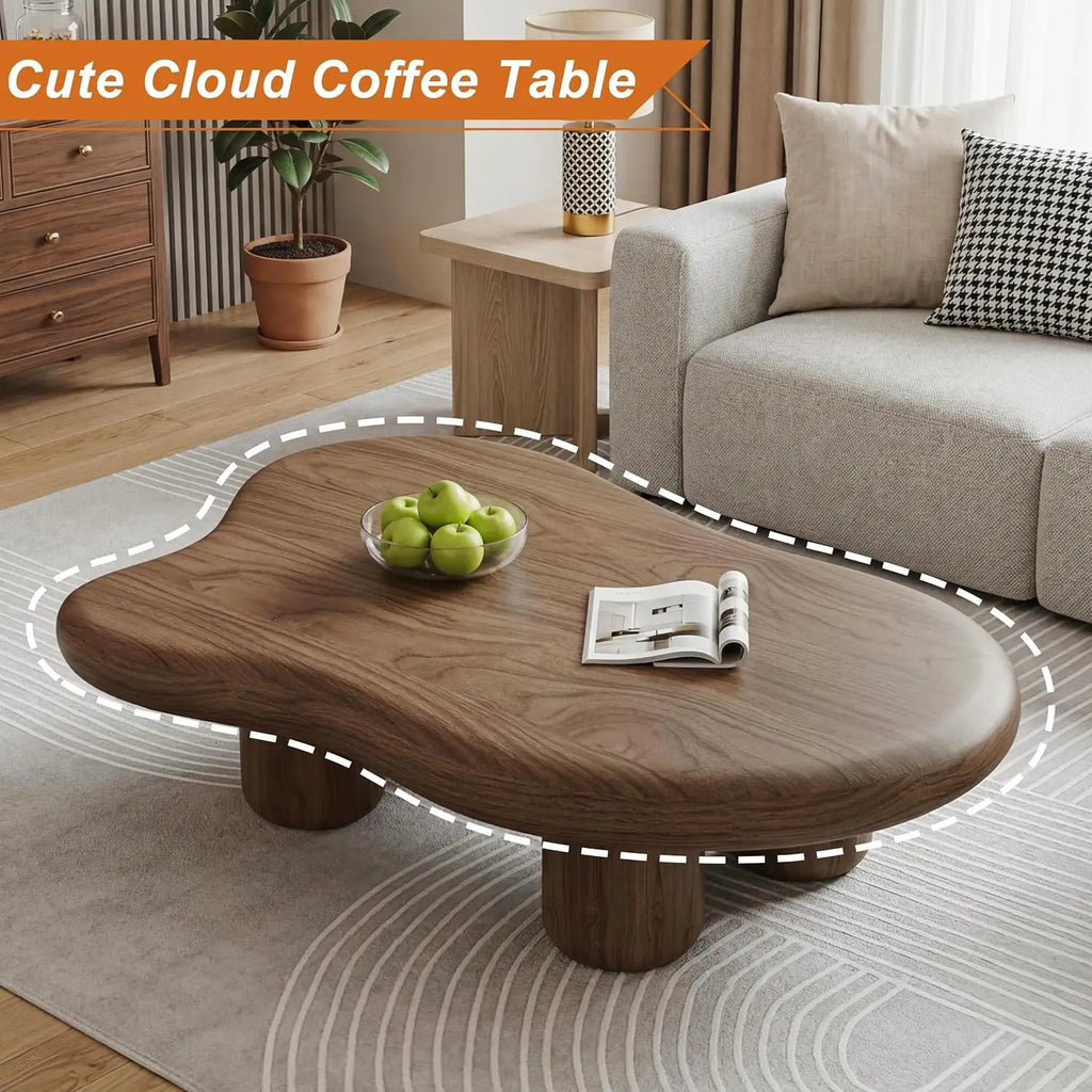 Modern cloud-shaped coffee table with drum legs in solid wood