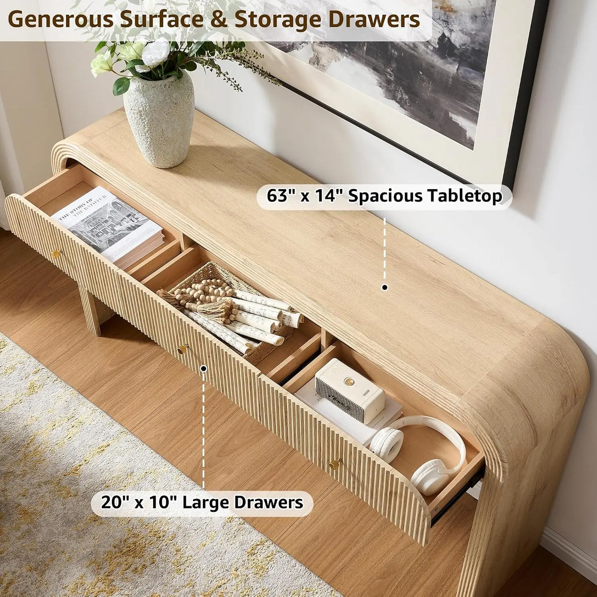 Curved fluted console table with three drawers and waterfall frame