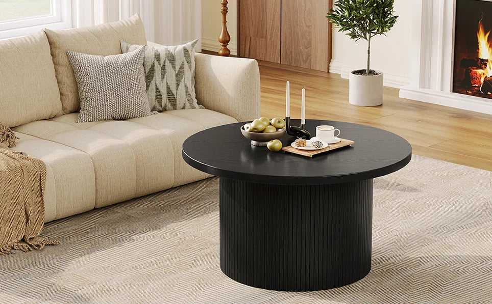 Modern fluted round coffee table in black — close-up product view