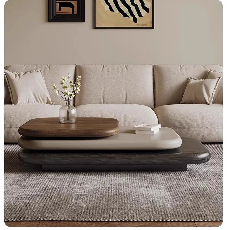 Rotating oval wood coffee table — side detail view