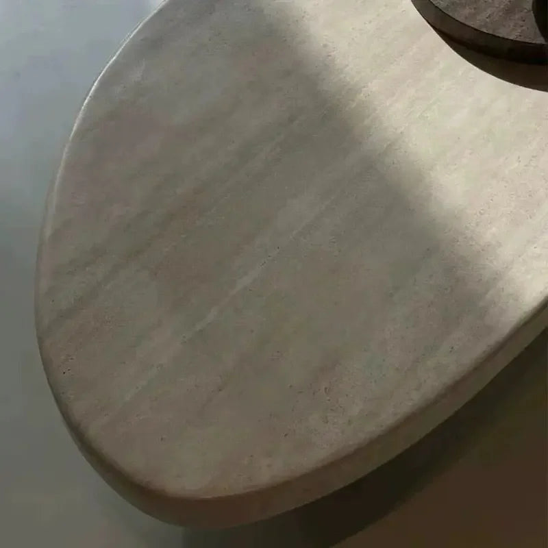 Beige marble coffee table — close-up design detail