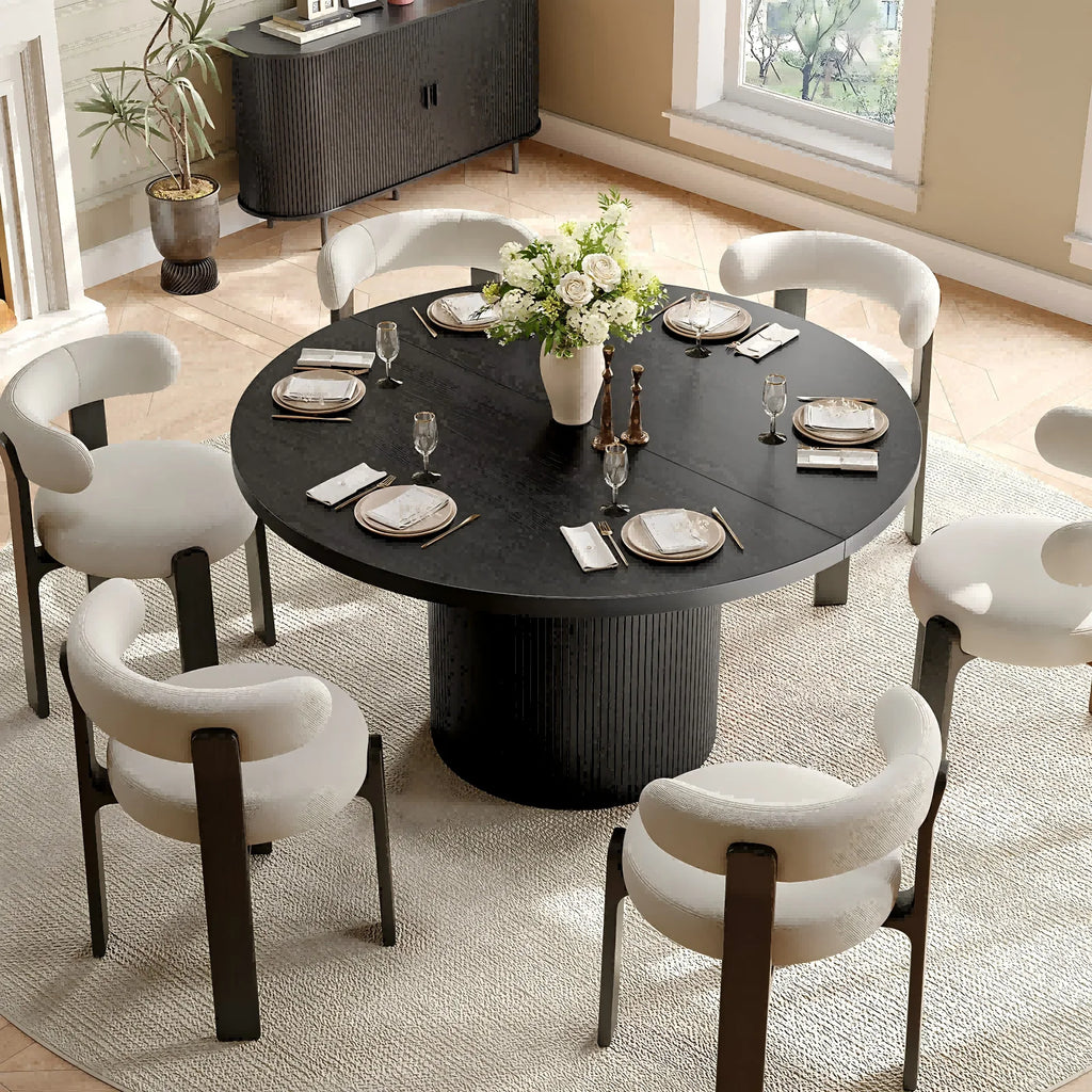Black fluted round dining table — side angle