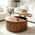 Fluted round coffee table with wood drum base and storage