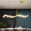 Organic wave LED pendant with brass and marble statement design
