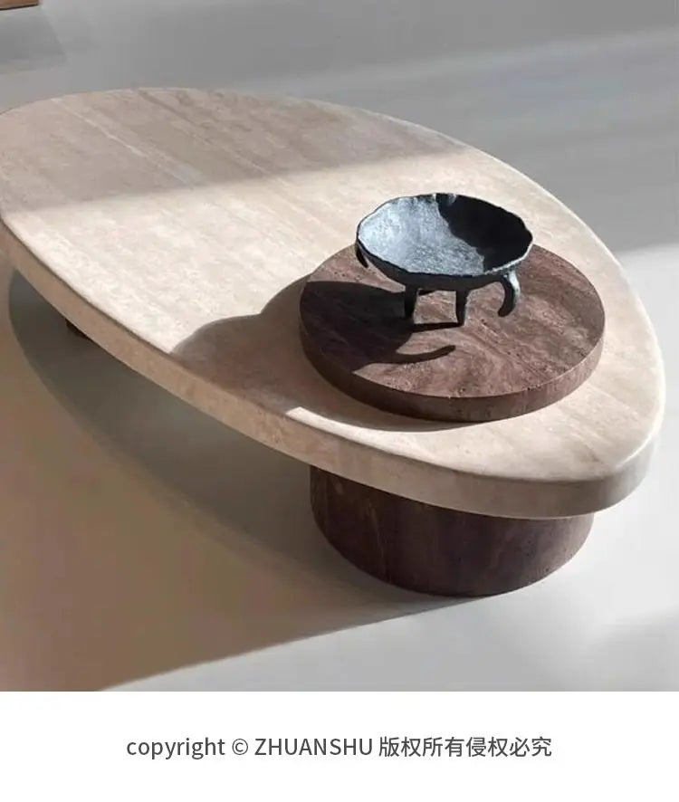 Beige marble coffee table — close-up design detail
