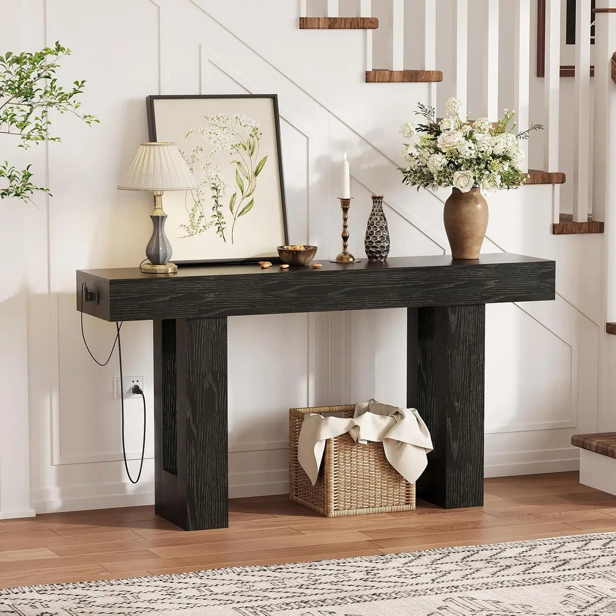 Console table with built-in power outlets in an entryway