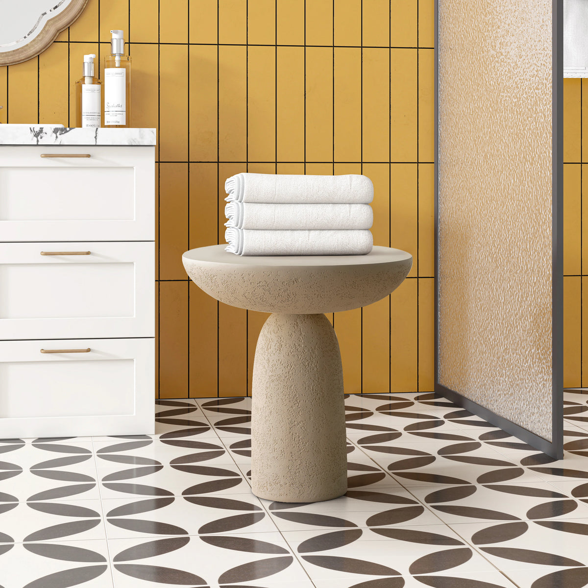 SHYFOY pedestal side table with stone-inspired hourglass base