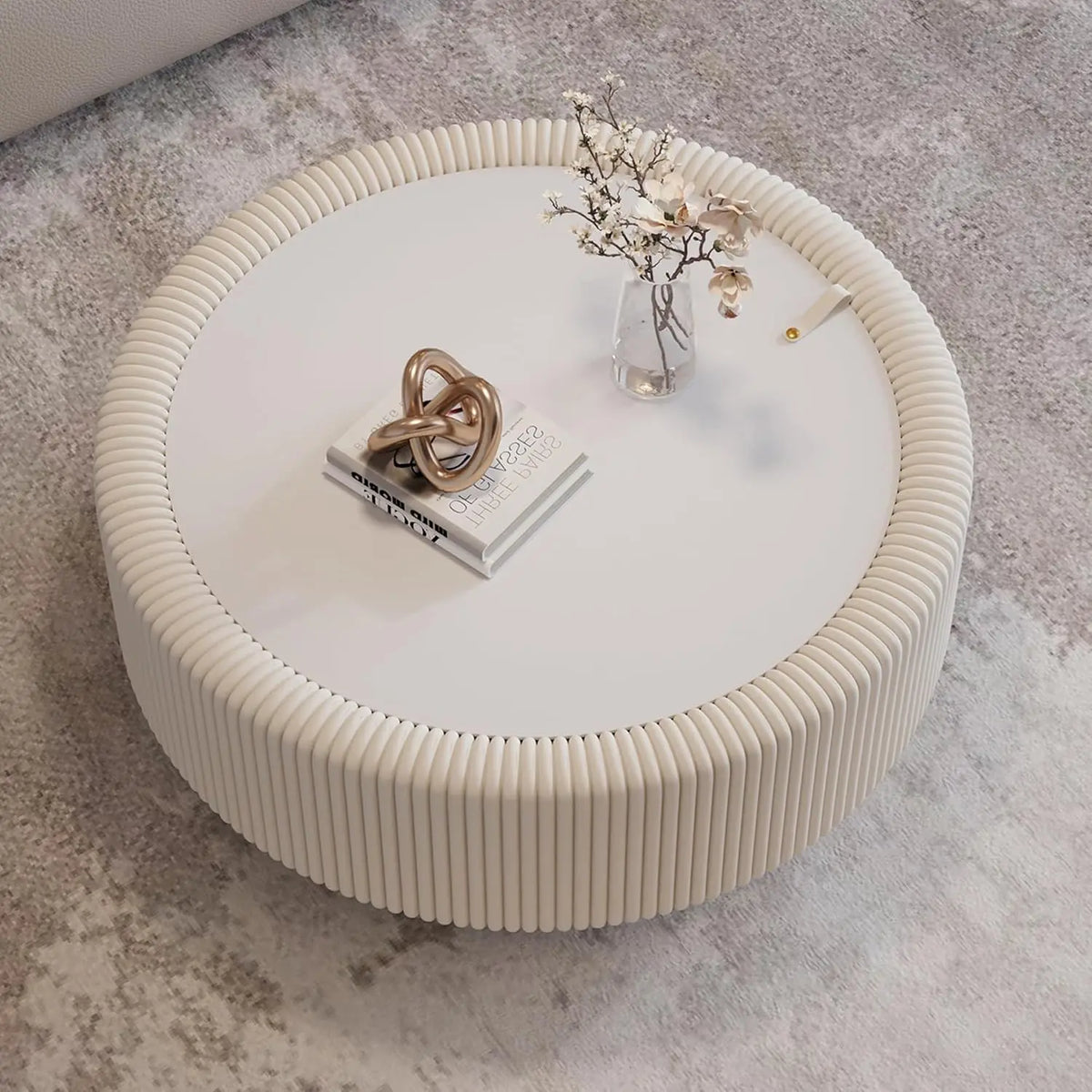 Round fluted coffee table with glass top and hidden storage