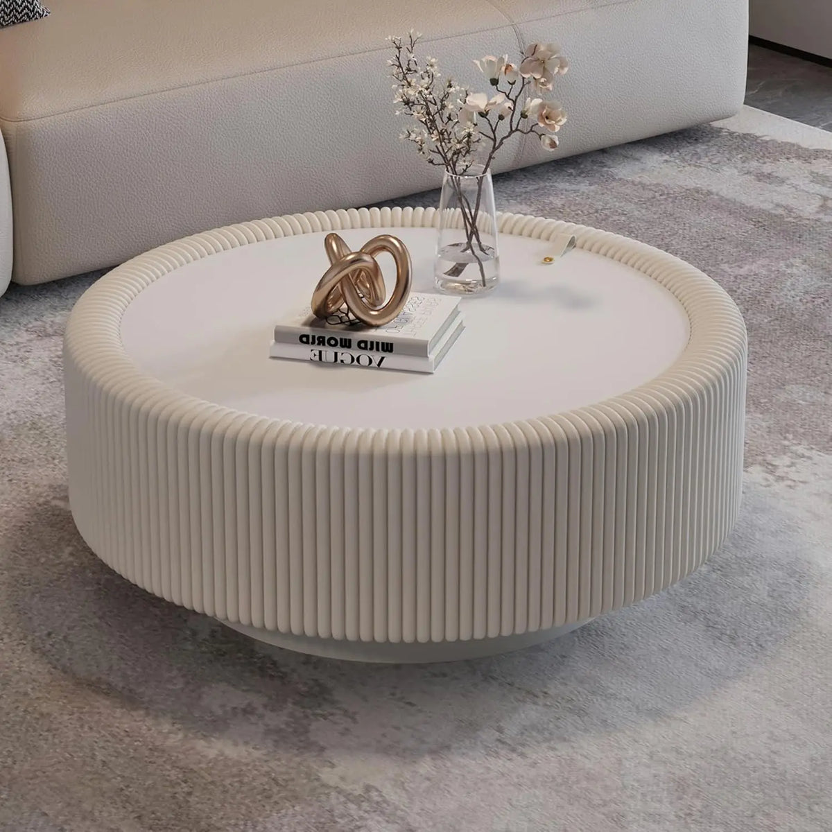 Round fluted coffee table with glass top and hidden storage