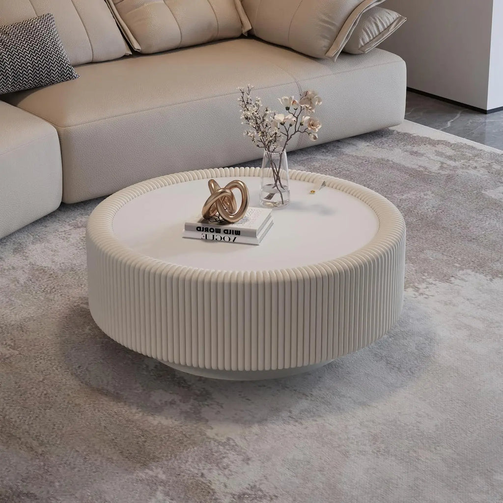 Round fluted coffee table with glass top and hidden storage