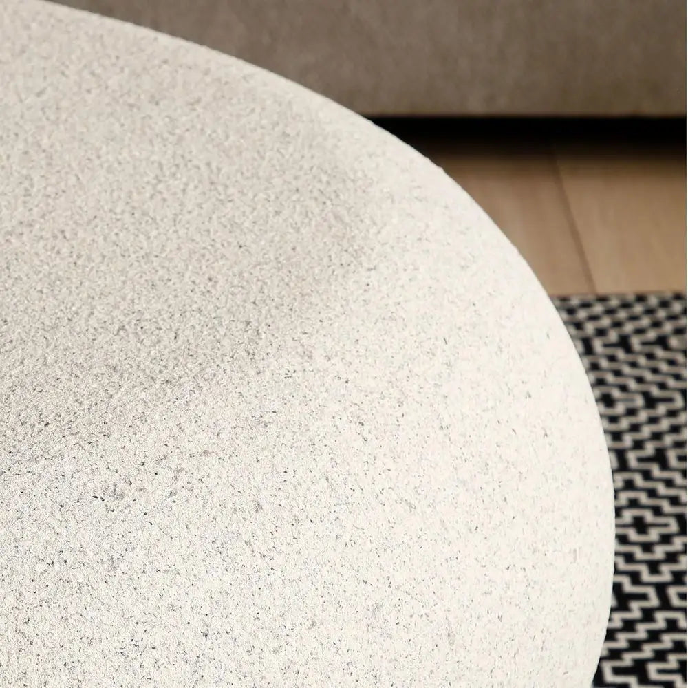 Oval stone coffee table — alternate angle